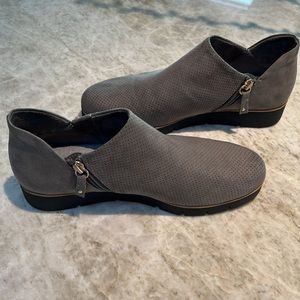 Dr. Scholls grey booties with black bottoms.